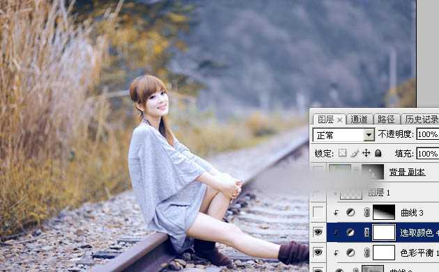 Photoshop为铁轨上的人物加上秋季淡冷色效果教程